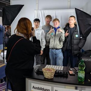 [Translate to español:] Messestand Fotografin